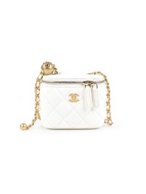 Chanel small gold ball makeup bag