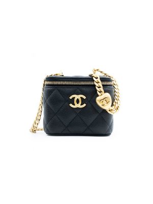 Chanel small gold ball makeup bag